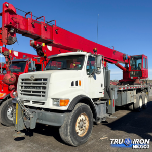 GRUA TITAN 2004 MANITEX 2892S SOBRE STERLING LT7500 DE 28 US TON