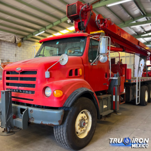 GRUA TITAN 2003 MANITEX 30100C SOBRE STERLING L7500 DE 30 US TON